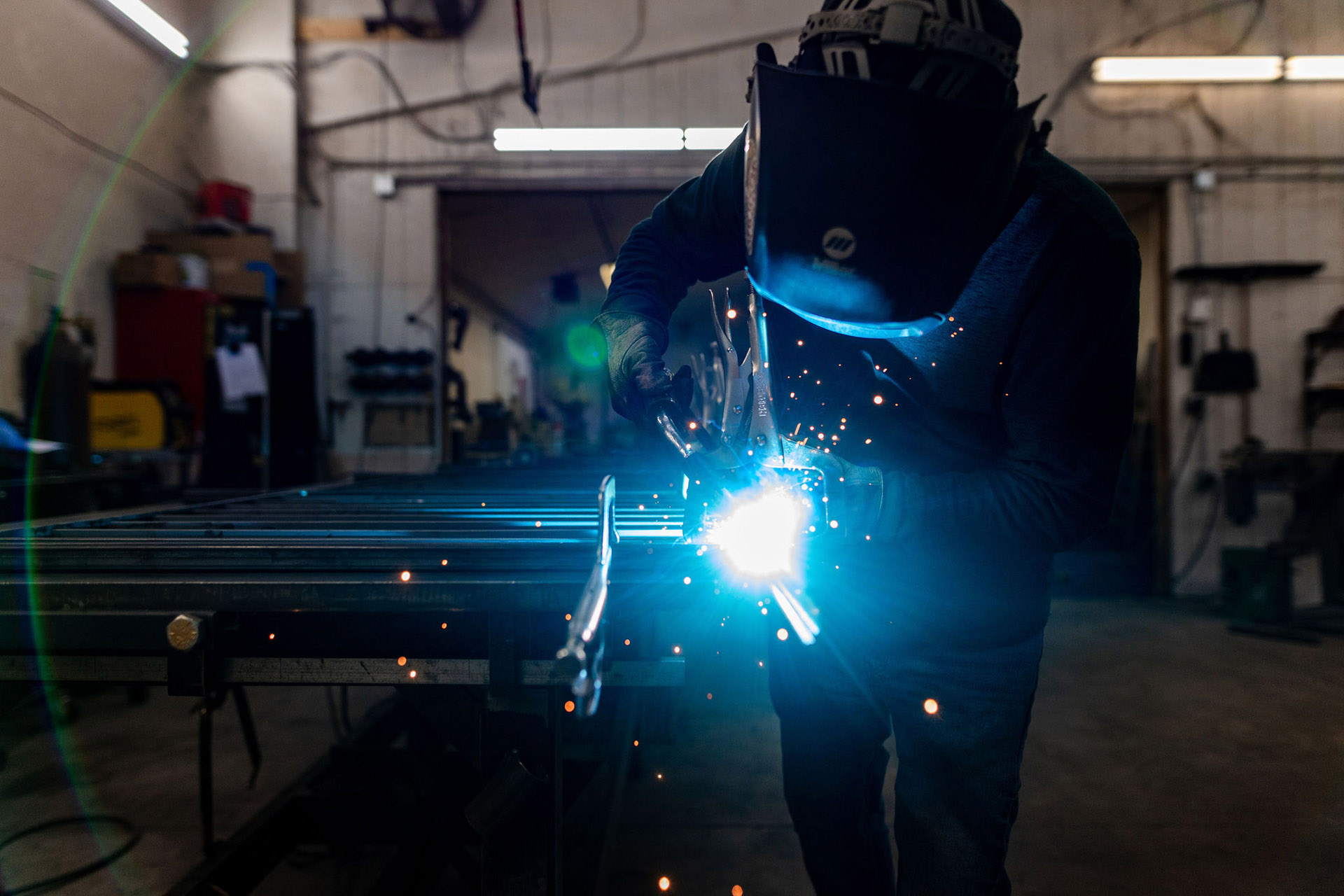 Loudoun Stair's welder showing they do metal work on stairs. 