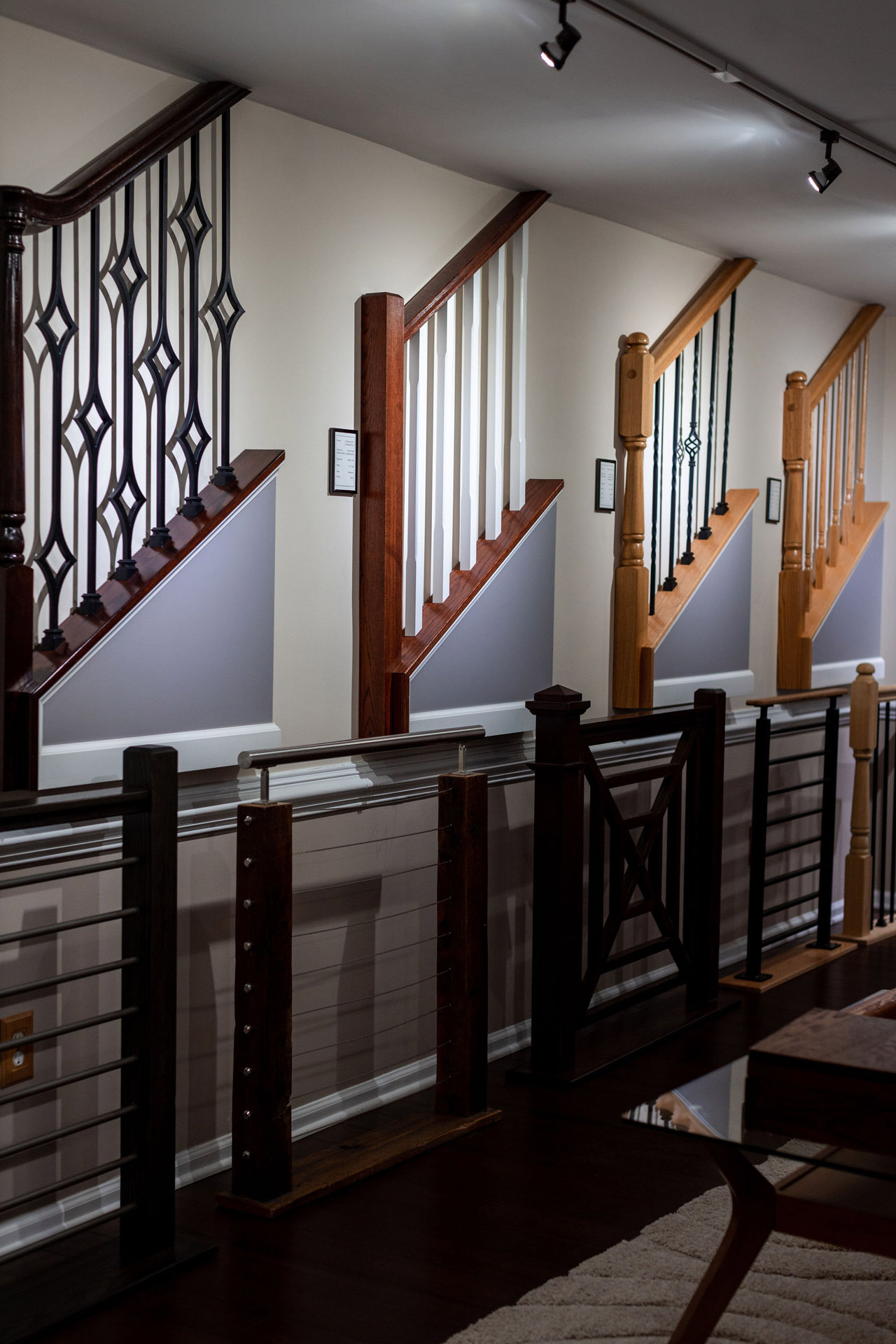 This shows the loudoun stairs showroom which offers a variety of rail options. 
